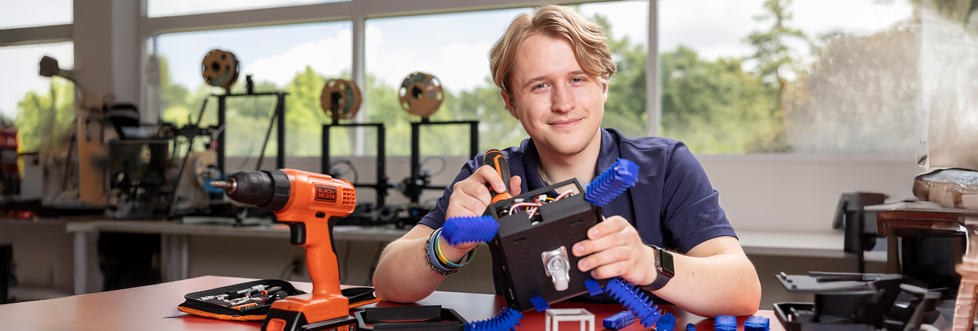 ksu teacher building a robot