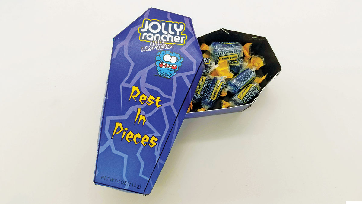 JollyRancher: Rest In Pieces / "JollyRancher: Rest In Pieces," candy box, base: 2.9 x 5.8 x 1.4 inches lid: 3 x 6 x 0.8 inches print product, 2023. This design promotes the blue raspberry Jolly Rancher brand with a fun, Halloween-themed packaging concept.