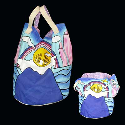  / Photograph of the Laundry "Mom" tote from the tote bag collection. This image contains two views of the tote.