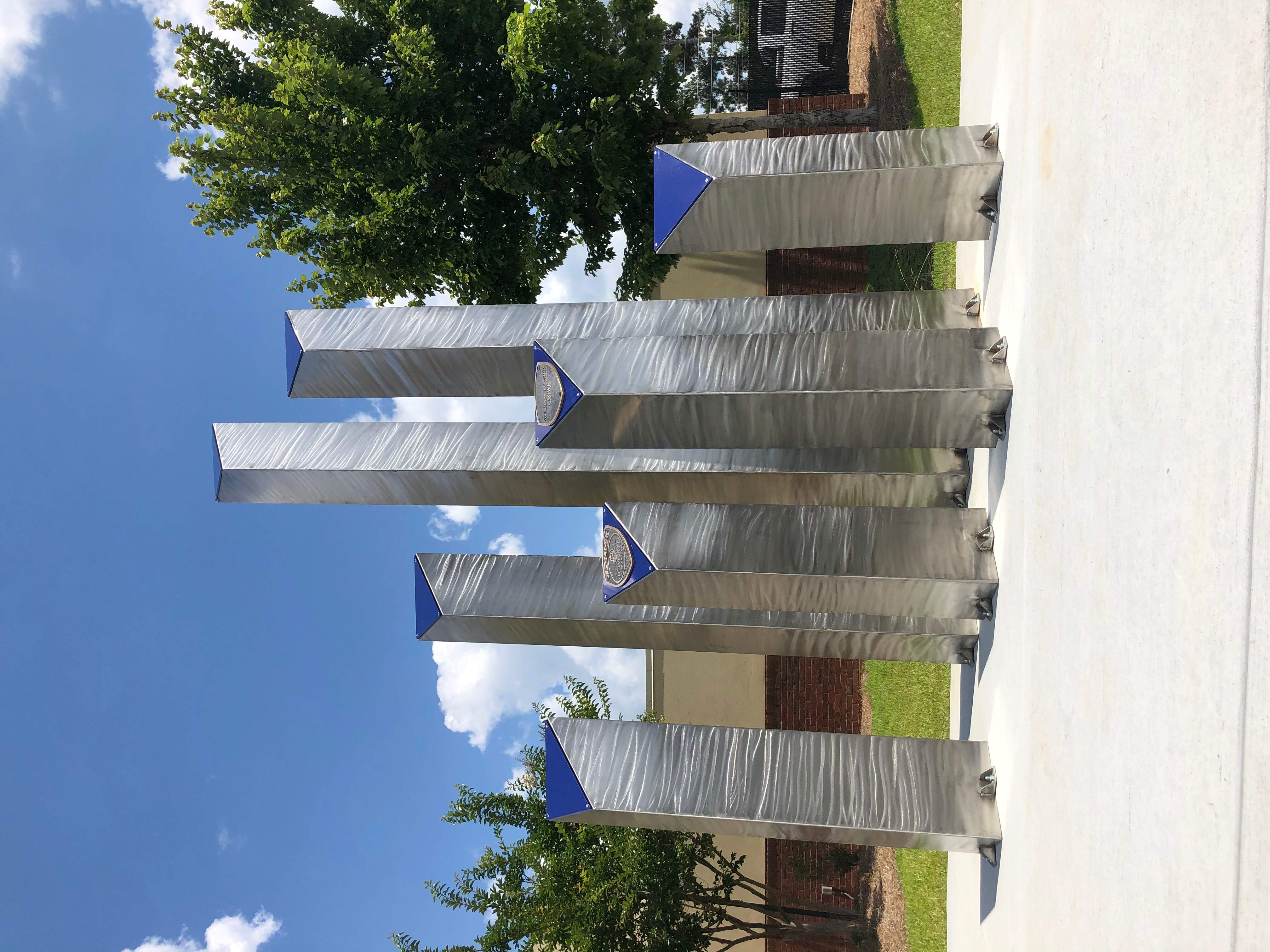 Acworth Police Department Memorial Monument, Stainless Steel, Powder Coated Mild Steel, Cast Bronze, 2020. Acworth Georgia / Acworth Police Department Memorial Monument, Stainless Steel, Powder Coated Mild Steel, Cast Bronze, 2020. Acworth Georgia