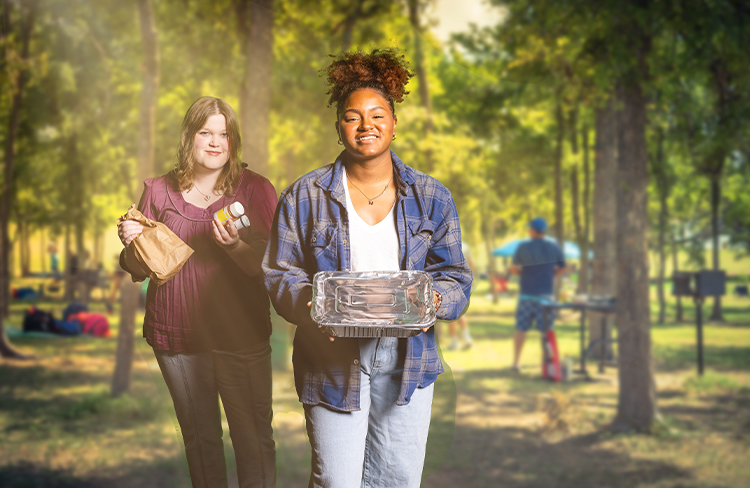 image of black and women women at a bbq in the park