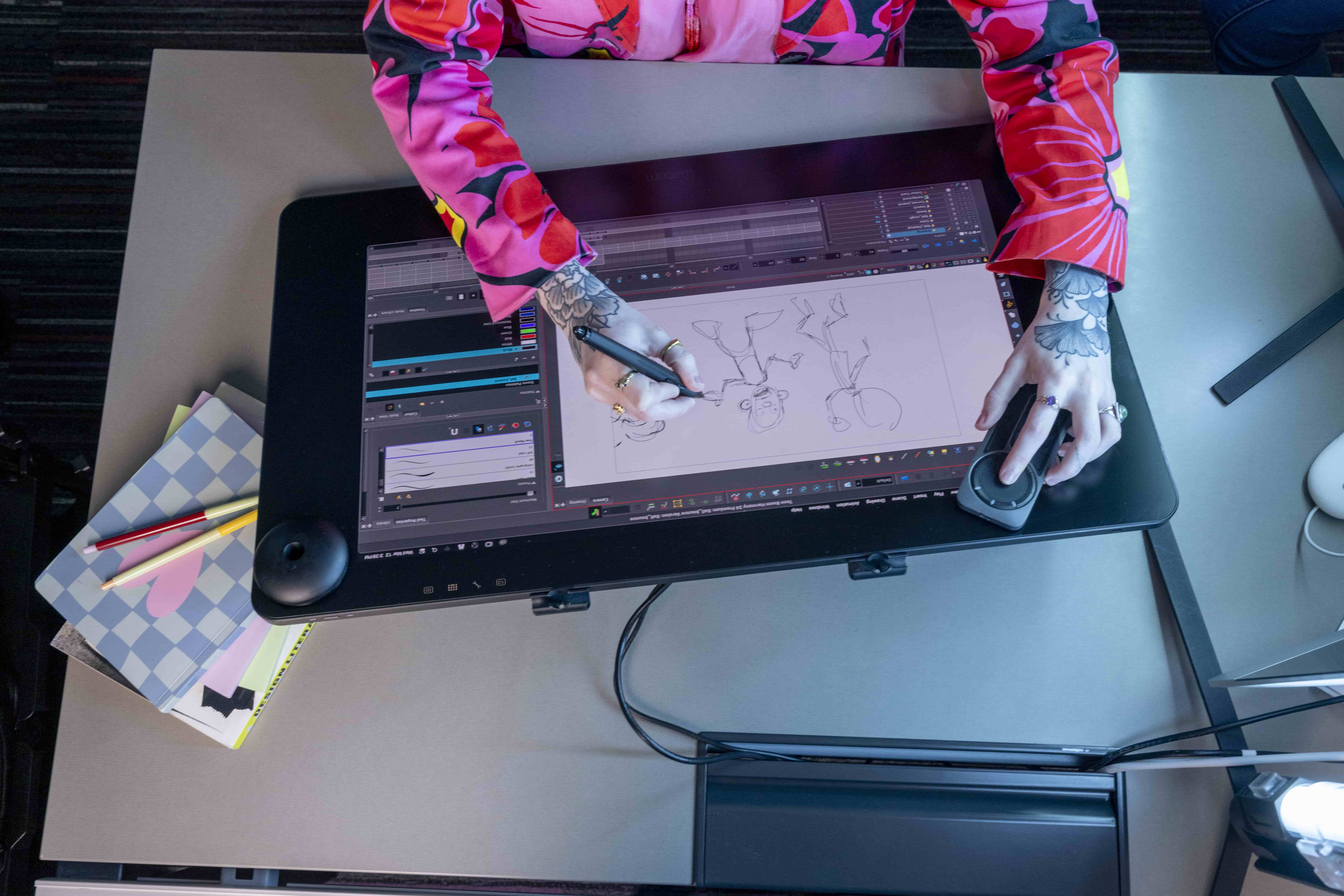 woman drawing on a wacom tablet