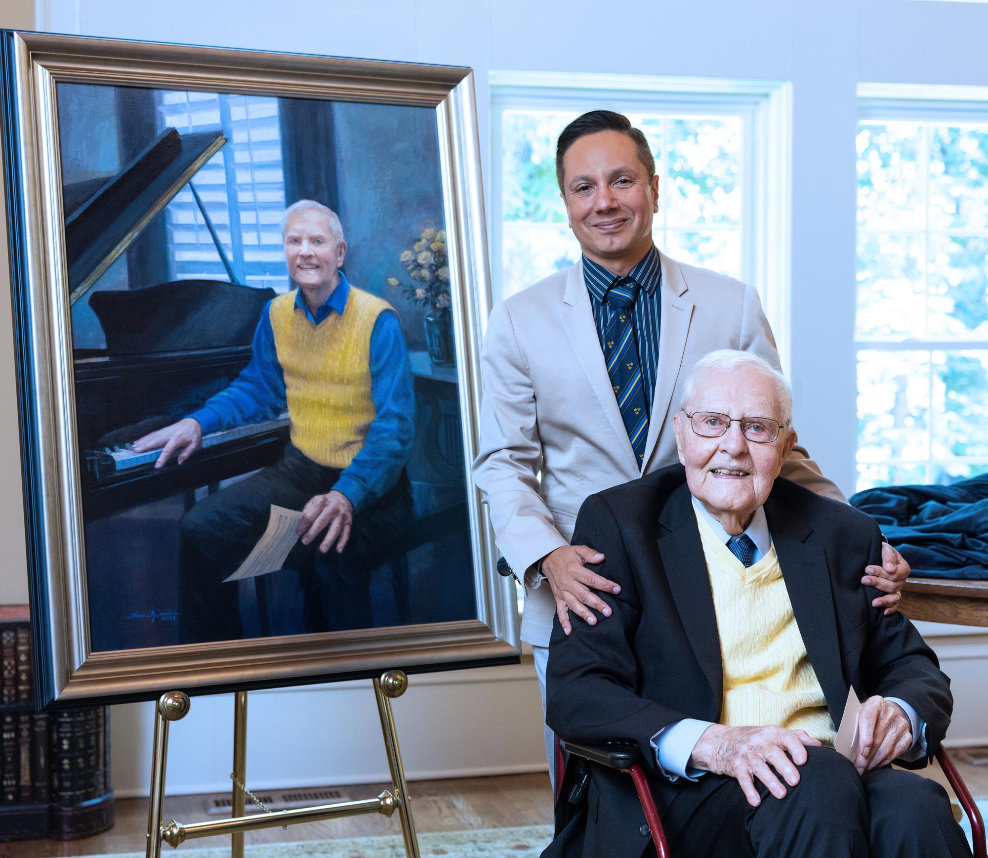 bob geer and ivan pulinkala at the unveiling of geer's portrait