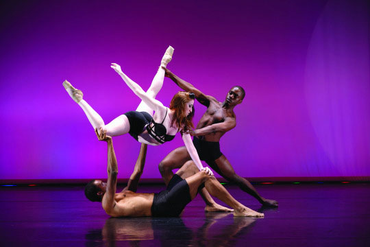 three student dancers on stage