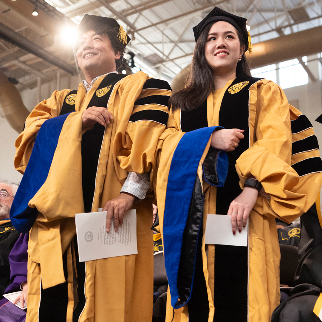 InChan Hwang and Linglin Zhang accept their doctoral degrees