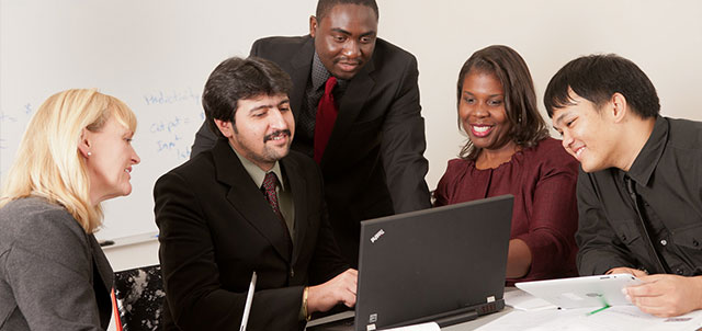 group of young professionals working together