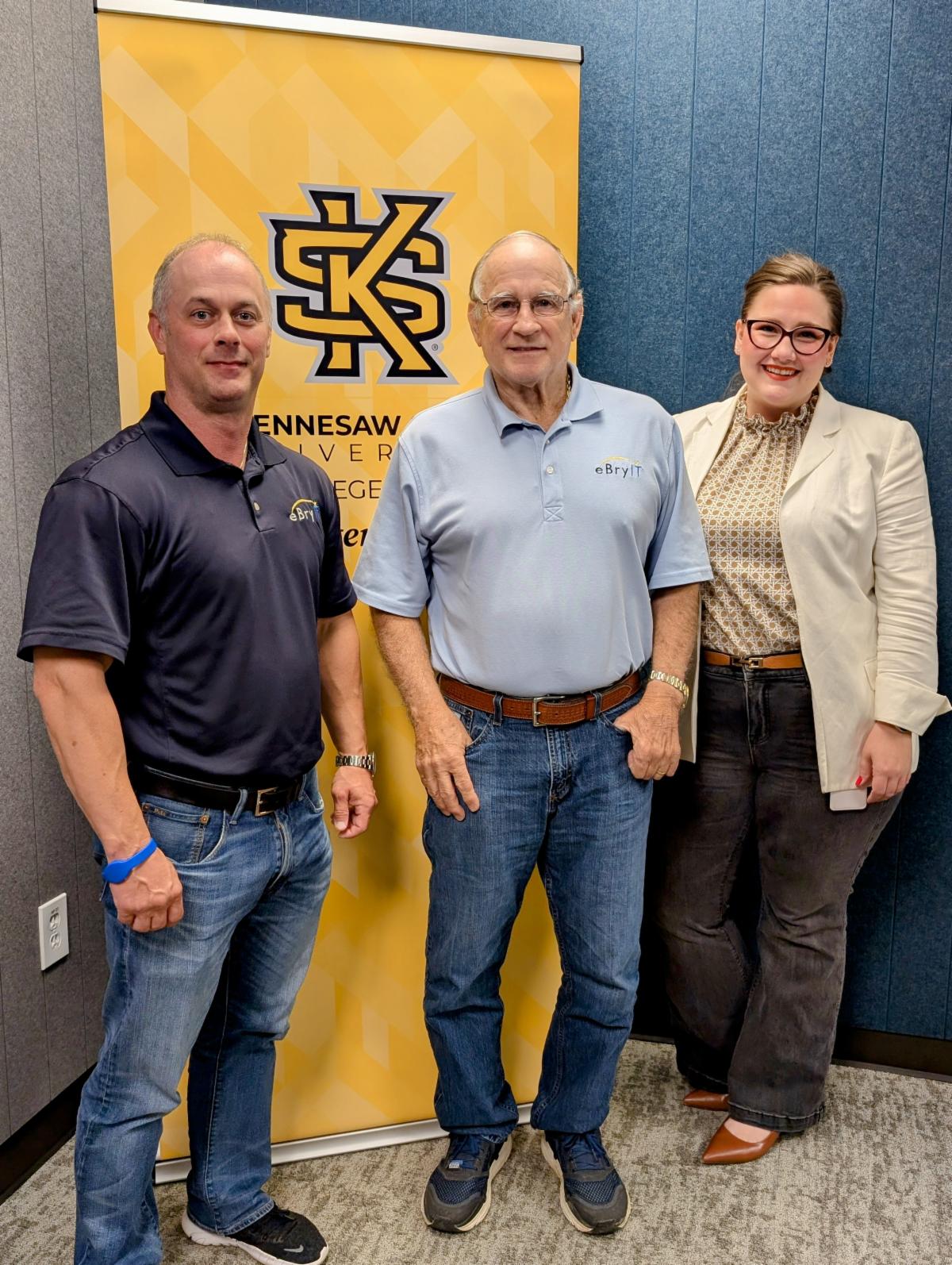 Walt Bryant (center), Founder of eBryIT, along with his son Trey Bryant, President, and Dr. Sara Davis, Director of the Family Enterprise Center at KSU