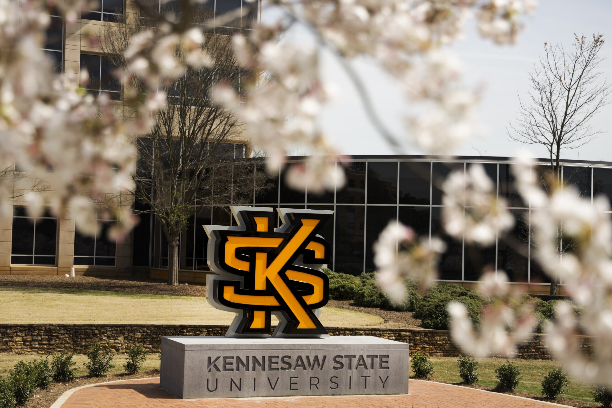 kennesaw hall cherry tree KS logo