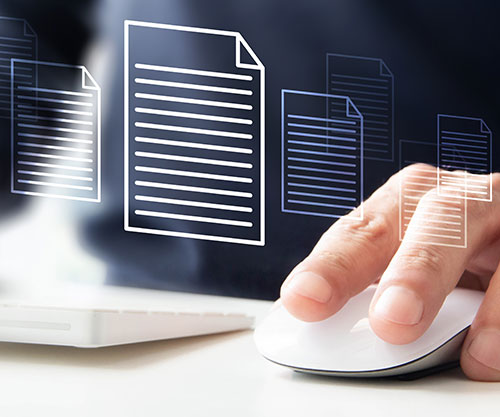 A hand hovering over a computer mouse, with multiple document icons floating above it, suggesting the concept of digital document management or document mapping.