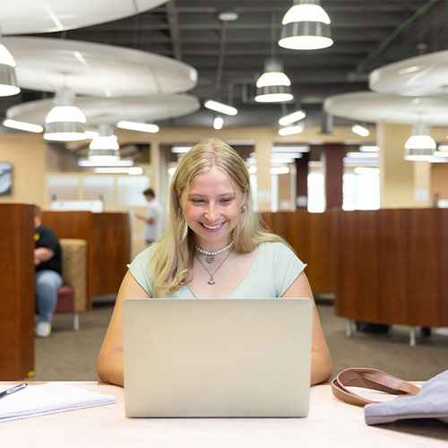 ksu student using their laptop.