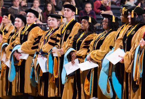 group of ksu faculty at the graduation ceremony.