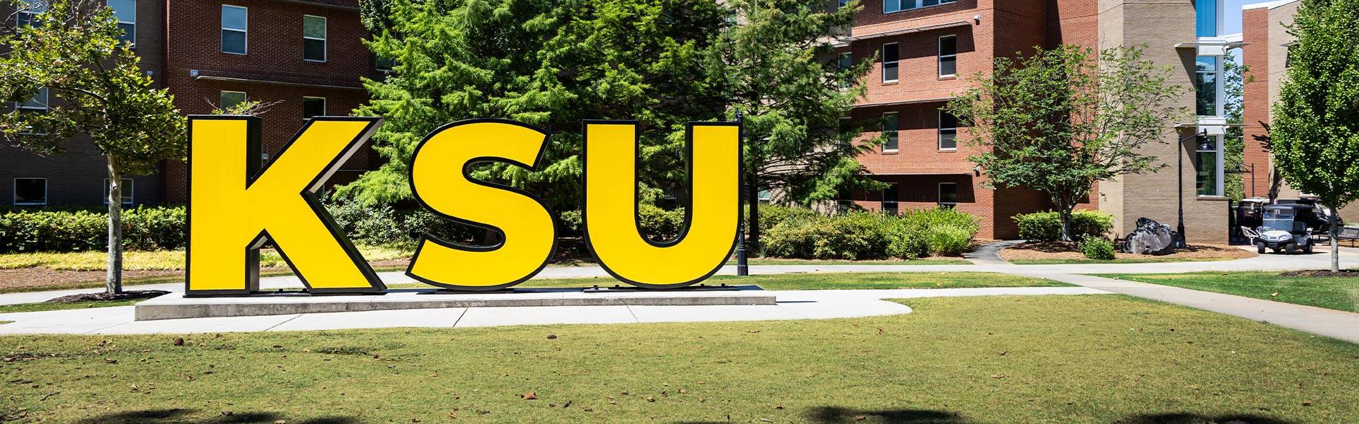 "ksu" sign on campus.