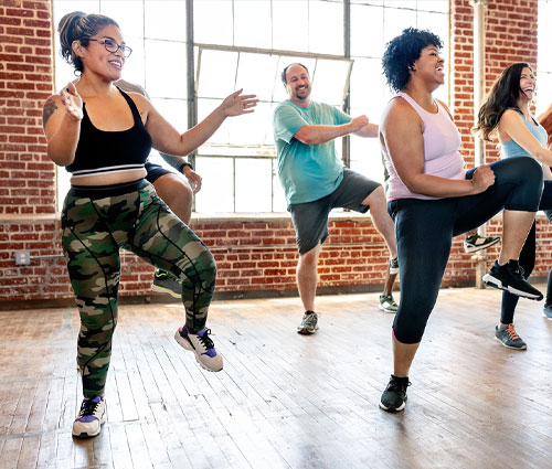 Faculty and staff attending a zumba class