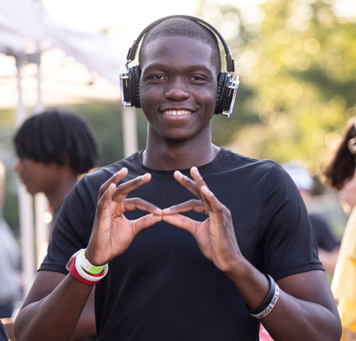 KSU Student flashing owl eyes for the camera.