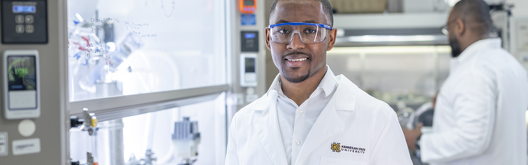 Chemistry student in laboratory.