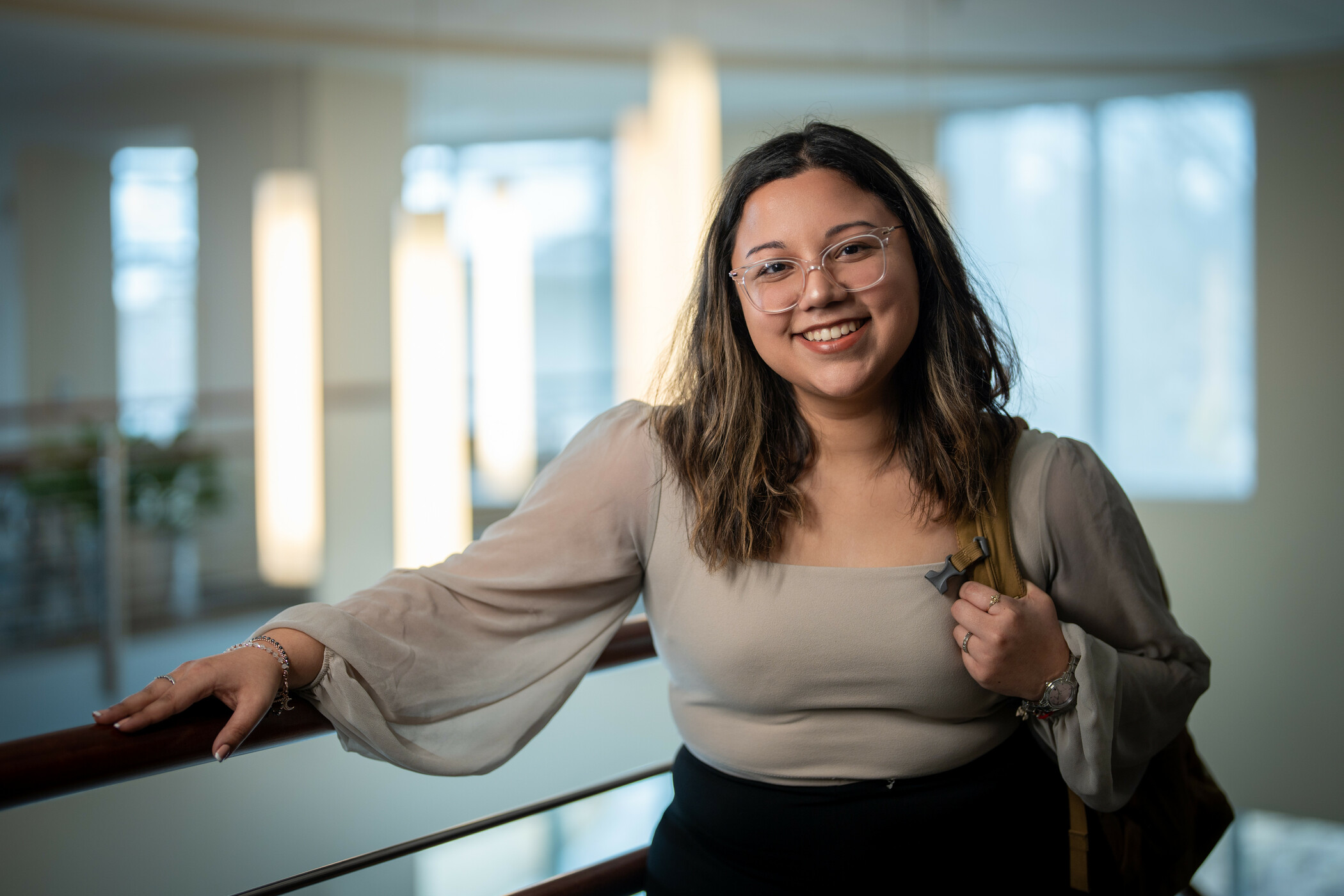 A female student with a backpack