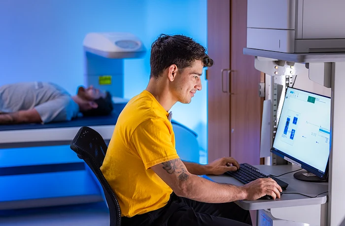 exercise science students in classroom using equipment