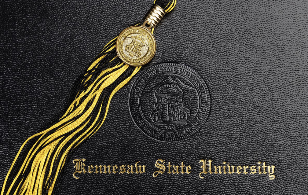 graduation tassel and degree book