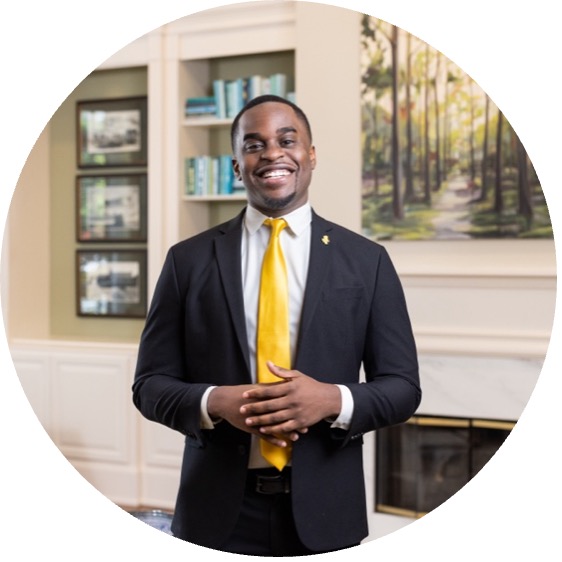 Smiling student with yellow tie