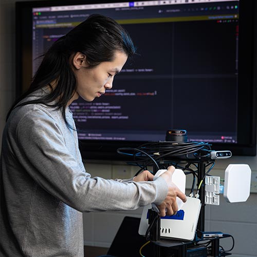 information technology student working on a project.