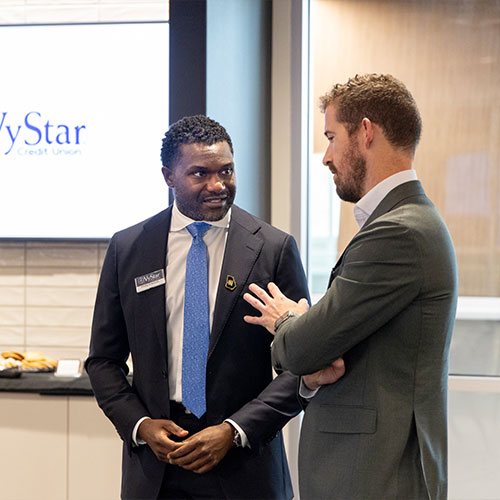 ksu business students having a discussion.