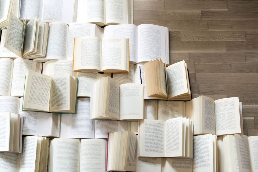 floor full of open books