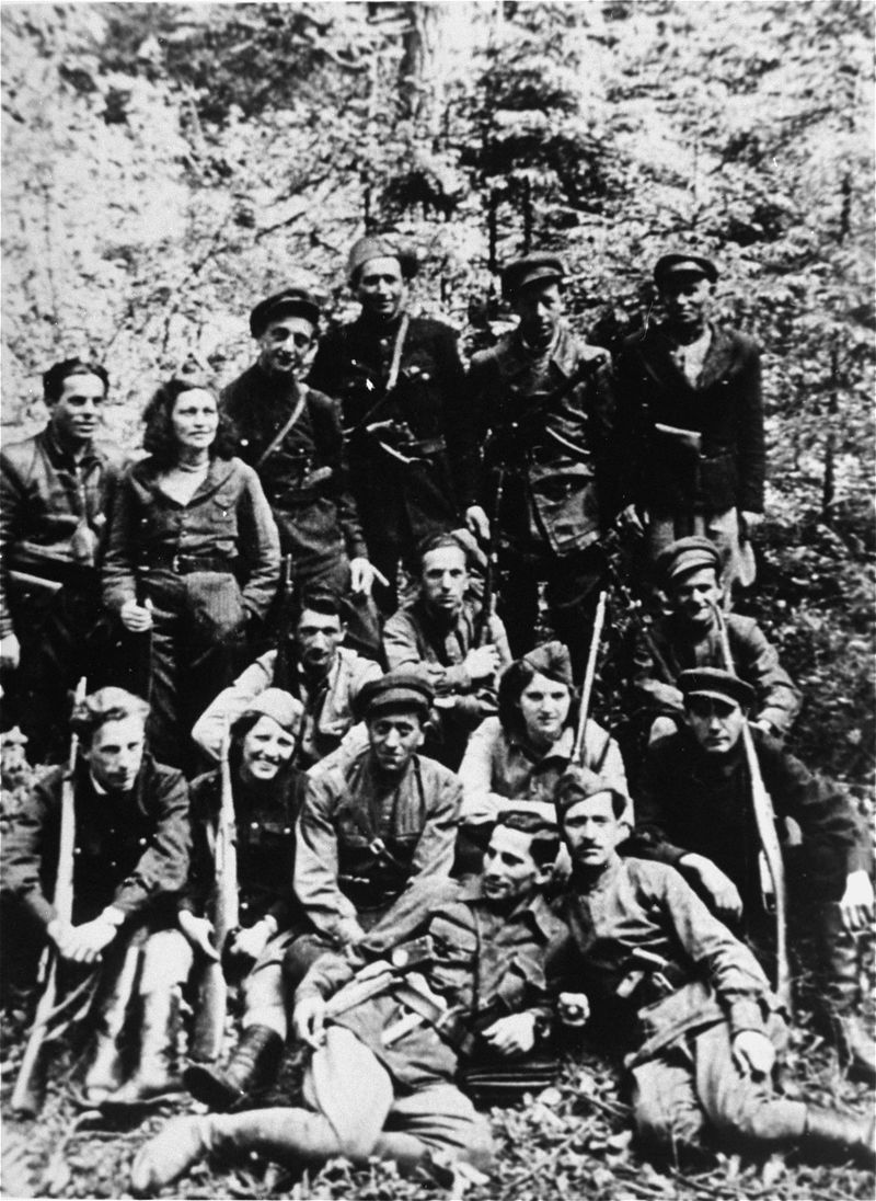 Group portrait of a Jewish partisan unit operating in the Lithuanian forests. Many of its members had been involved in resistance activities in the Kovno ghetto.