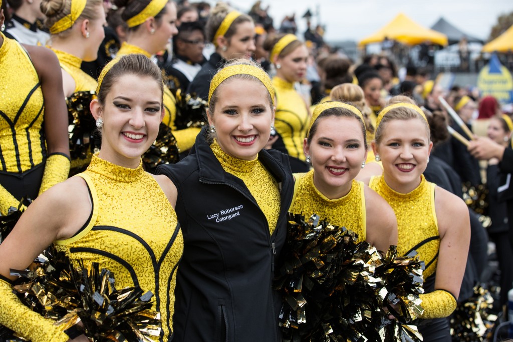 marching band team with pom poms 