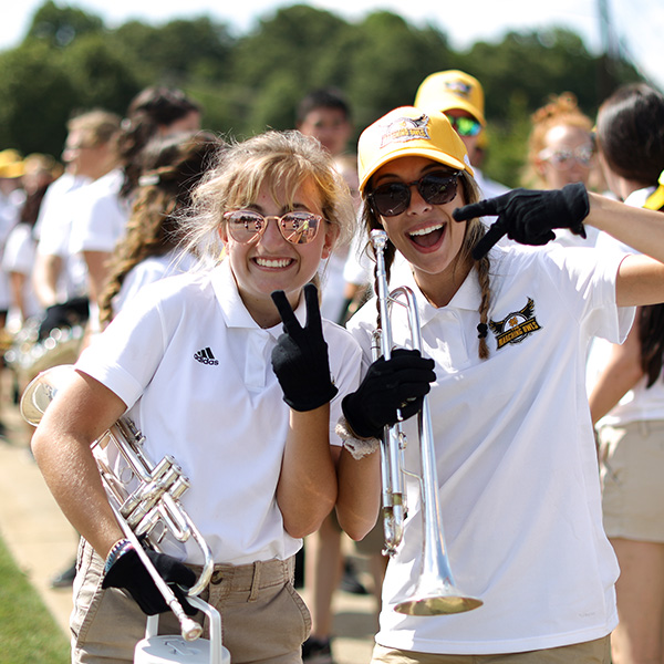 2 ladies with trumpets