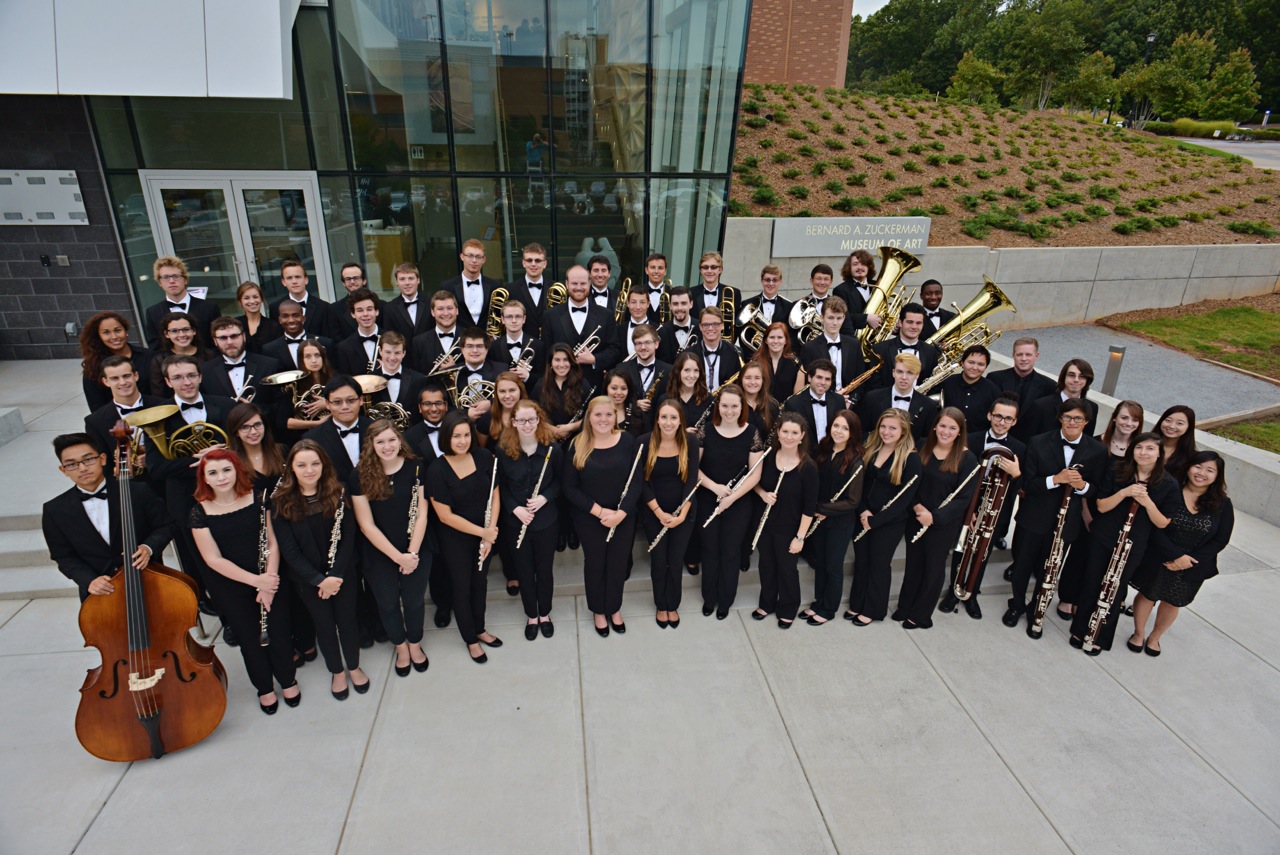 group photo of musicians with instruments