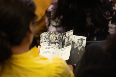 A Launch 24 attendee reads 'Taking Flight.'