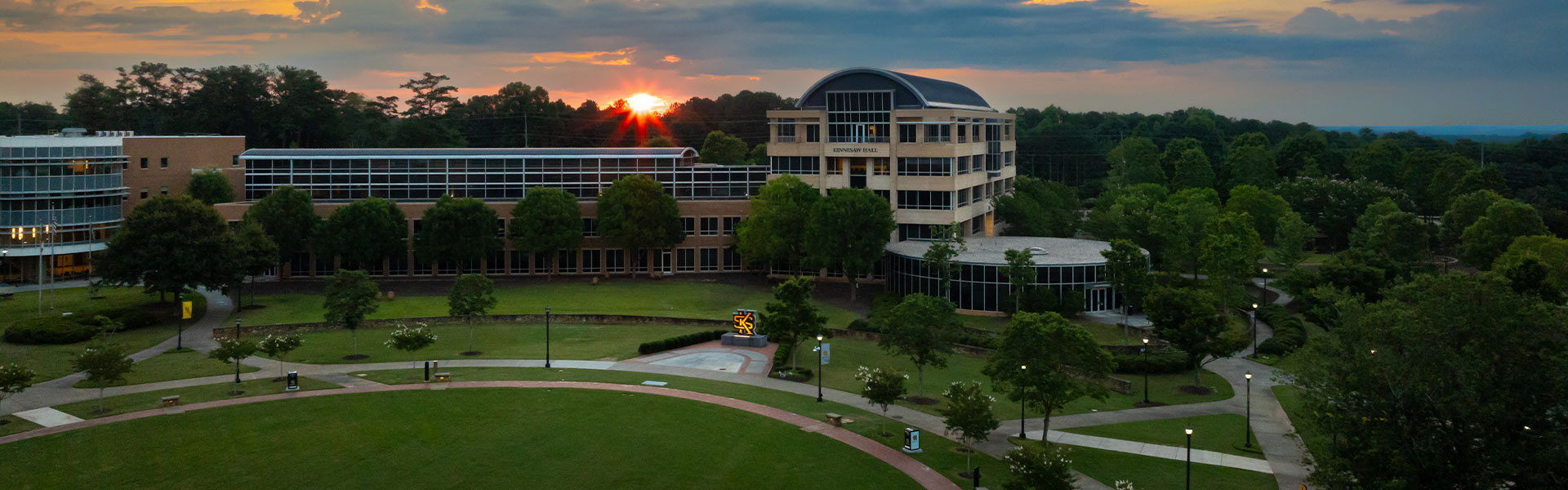 drone view of kennesaw hall at sunset.