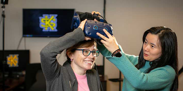 woman using a vr headset in the College of Computing & Software Engineering