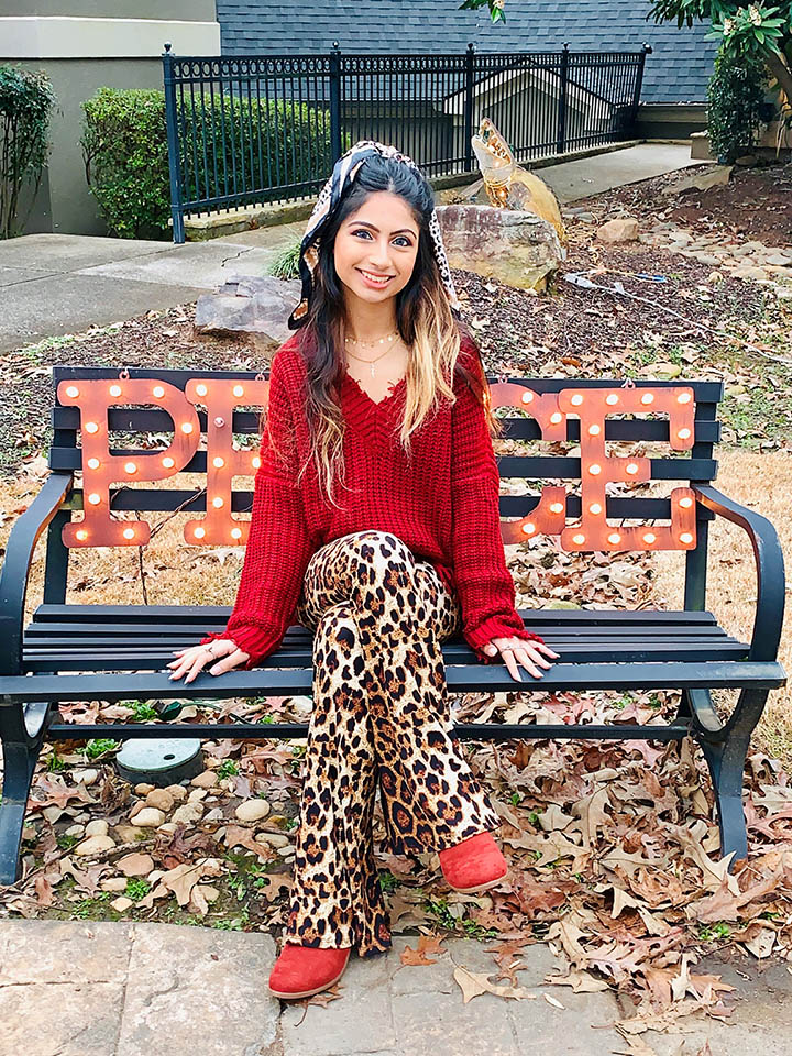 matasha sitting on a park bench