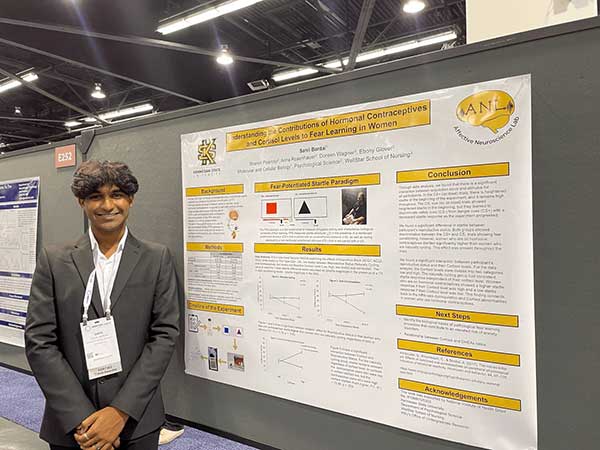 Sahil Bardai  Standing next to his research who turned his passion for mental health into a rewarding undergraduate research career.