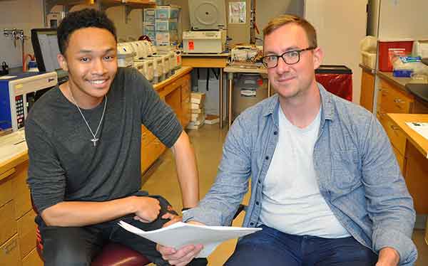 Trae with Dr. Kirk Burkhart, Postdoctoral Fellow in the Horvitz lab at MIT. 