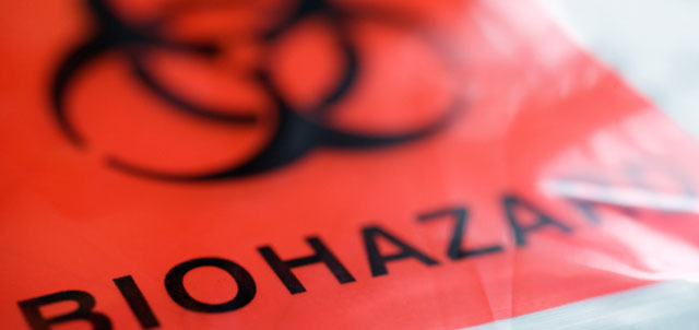 red biohazard label