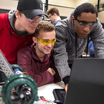 Mentoring a peer in front of computer