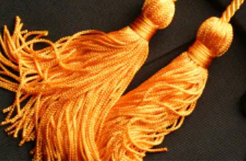 Photo of gold graduation cords