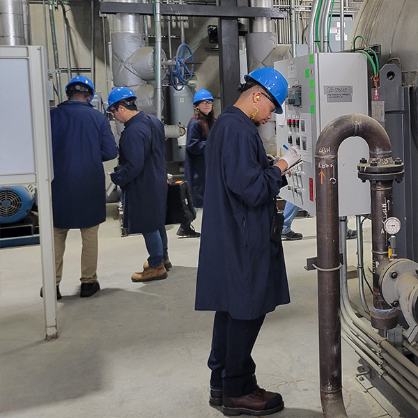 men wearing blue hard hats