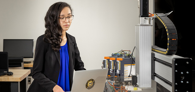 woman working in a robotics lab