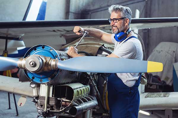 technician working on plane