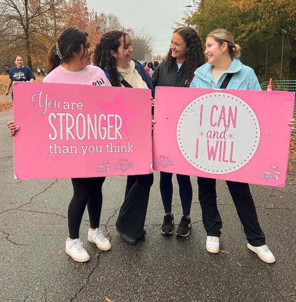Students volunteering at the breast cancer walk 