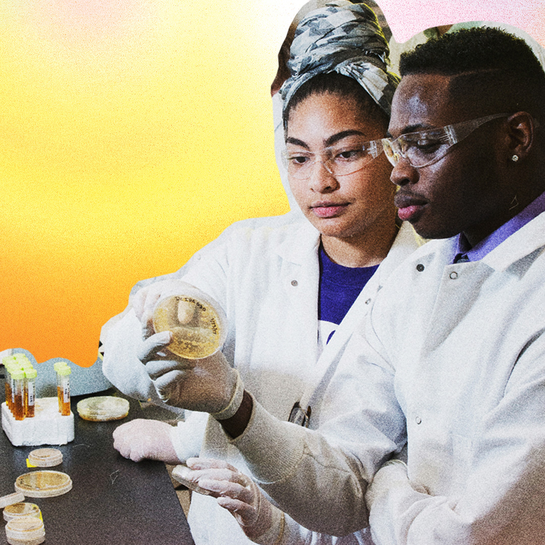 two ksu student in lab coats