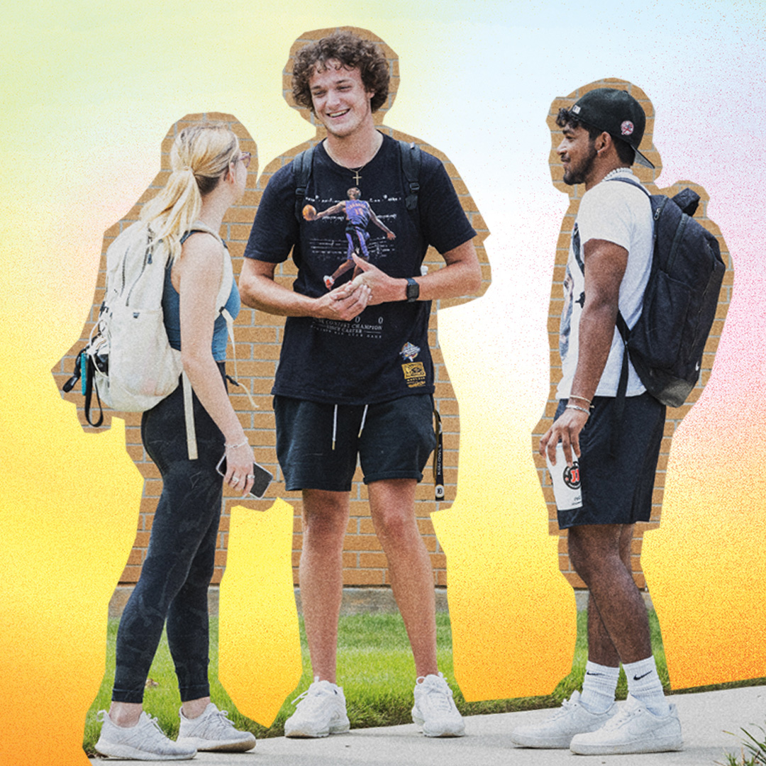 three ksu students talking on campus on a colorful background