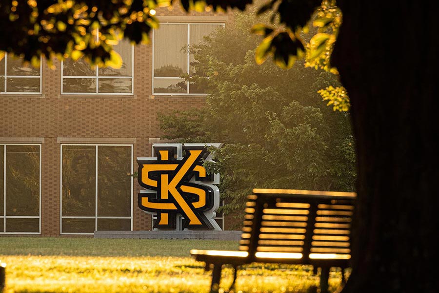 kennesaw state university statue at dusk.